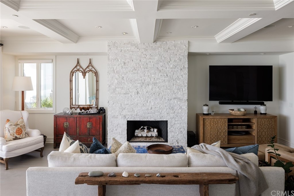 35271 Beach Road Dana Point, CA 92624 - Photo 22 of 61 a living room with furniture and a flat screen tv