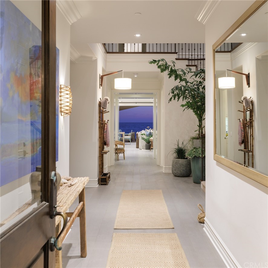 35271 Beach Road Dana Point, CA 92624 - Photo 4 of 61 a view of a hallway with workspace and living room