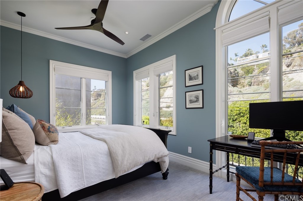 35271 Beach Road Dana Point, CA 92624 - Photo 46 of 61 a bedroom with a bed and a window