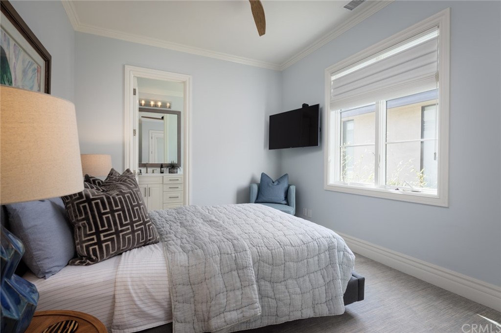 35271 Beach Road Dana Point, CA 92624 - Photo 47 of 61 a bedroom with a bed and flat screen tv