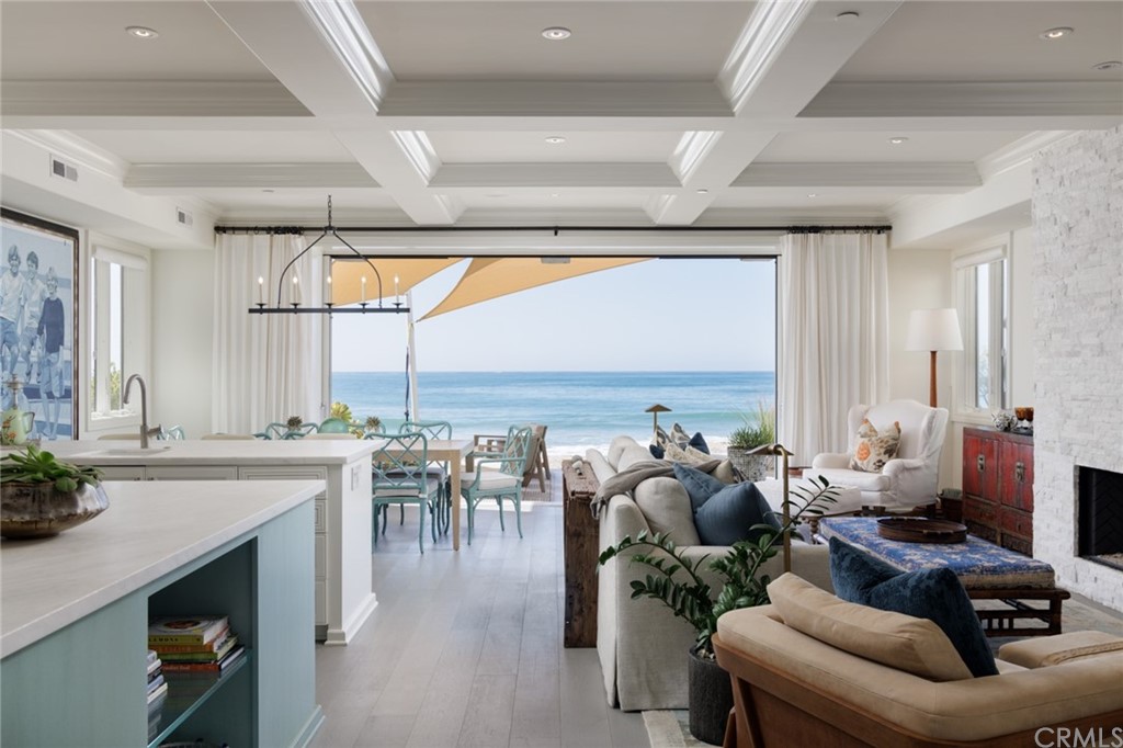 35271 Beach Road Dana Point, CA 92624 - Photo 5 of 61 a living room with furniture a dining table and chairs