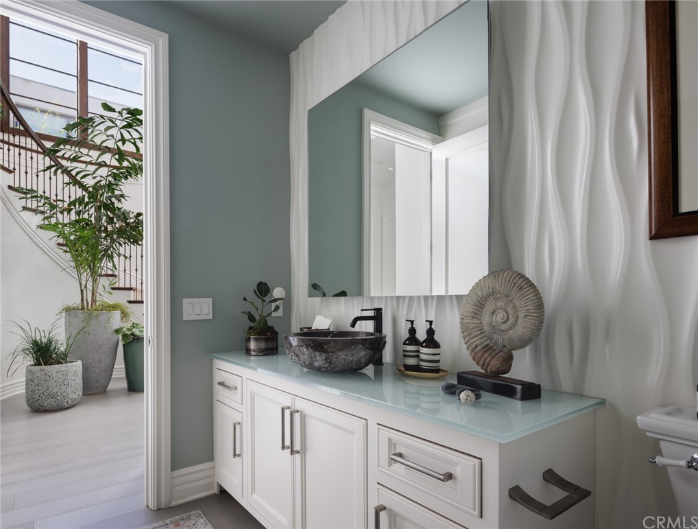 35271 Beach Road Dana Point, CA 92624 - Photo 51 of 61 a view of bathroom with a sink and mirror