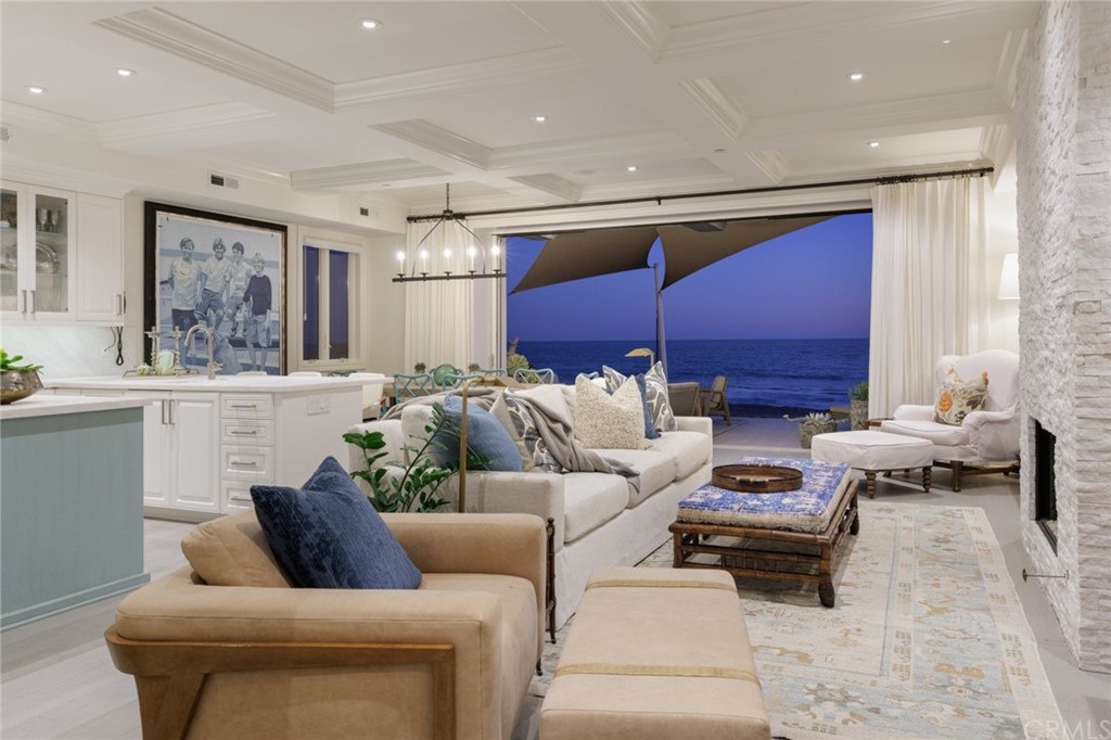 35271 Beach Road Dana Point, CA 92624 - Photo 55 of 61 a living room with furniture a large window and a potted plant