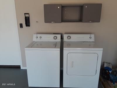 4957 Casper Road Mesa, AZ 85205 - Photo 17 of 24 a utility room with dryer and washer