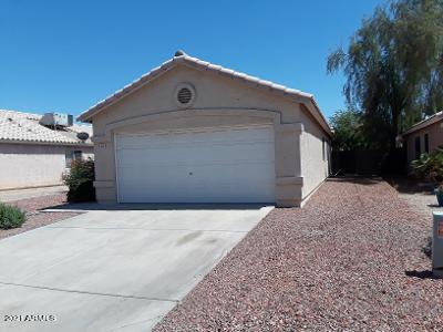4957 Casper Road Mesa, AZ 85205 - Photo 3 of 24 a front view of a house with a yard