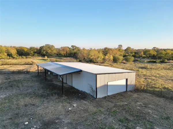 a view of house with lake view and mountain view