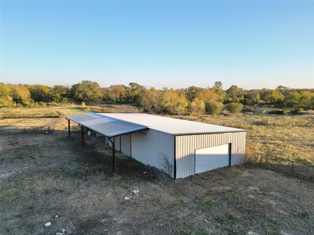 a view of house with lake view and mountain view