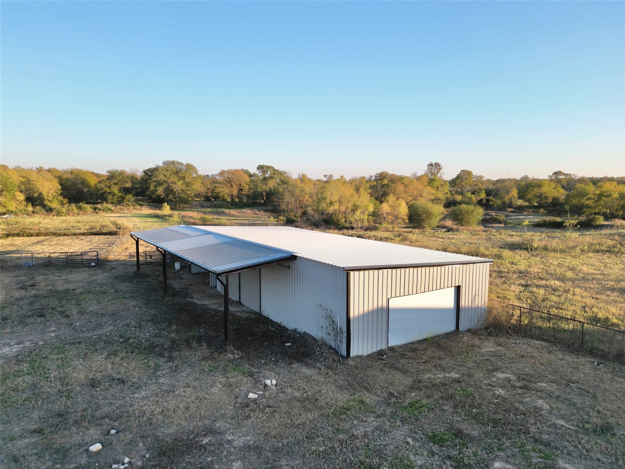 9477 County Road 420 Navasota, TX 77868 - Photo 12 of 25 a view of house with lake view and mountain view