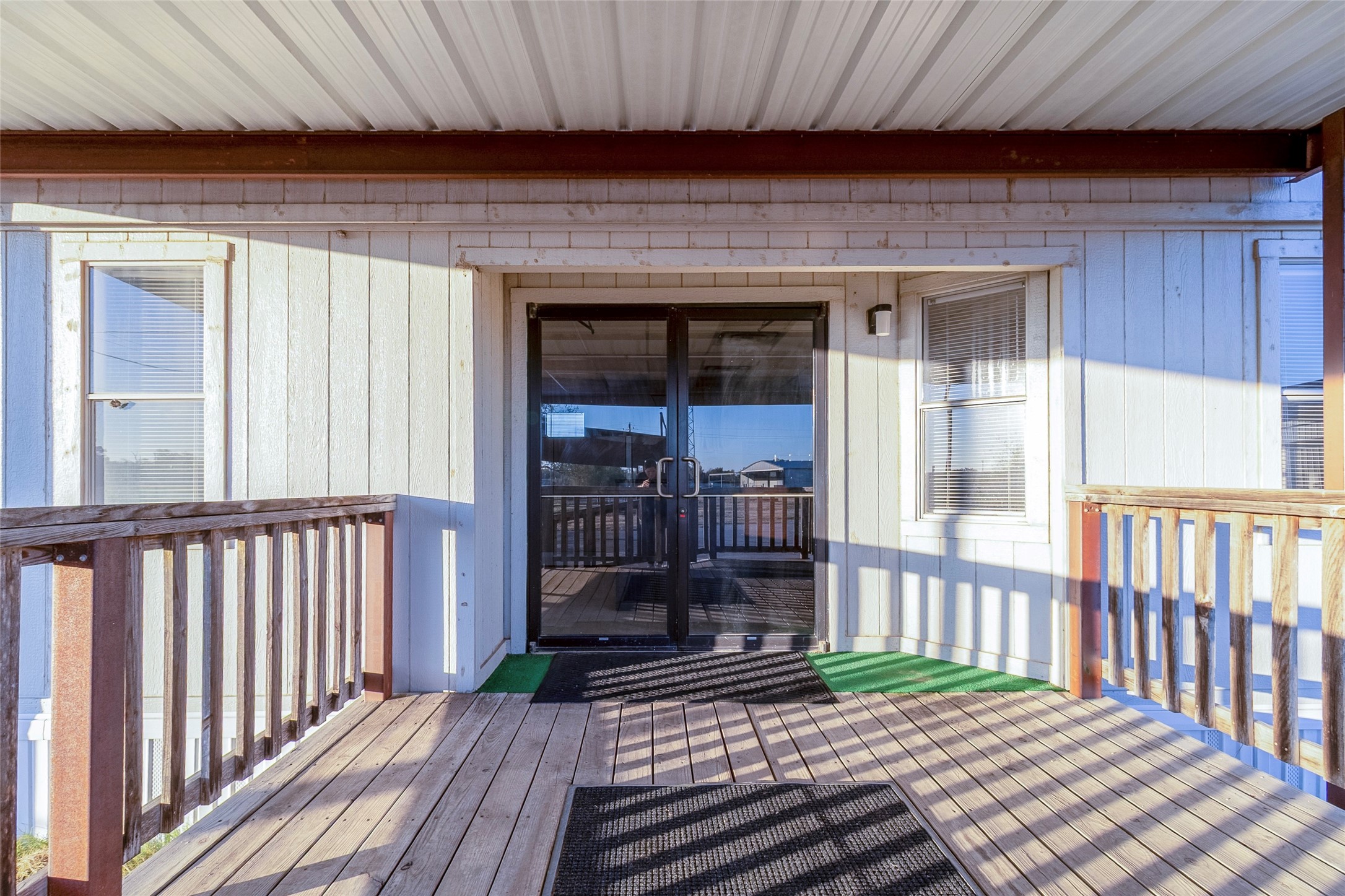 9477 County Road 420 Navasota, TX 77868 - Photo 16 of 25 a porch with wooden floor