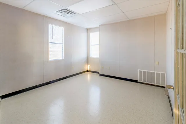 a room with furniture and a window