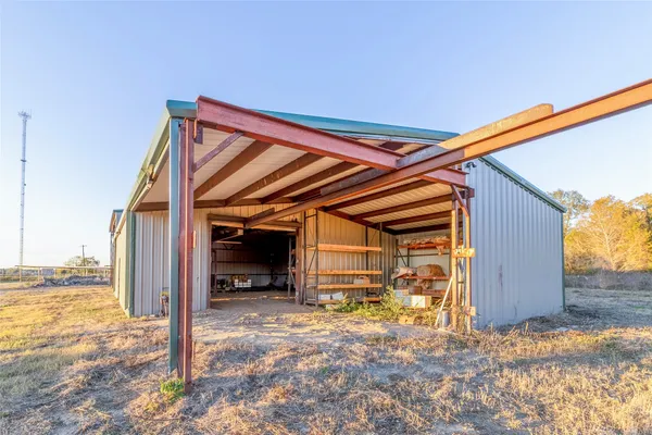 a view of a car park in front of house