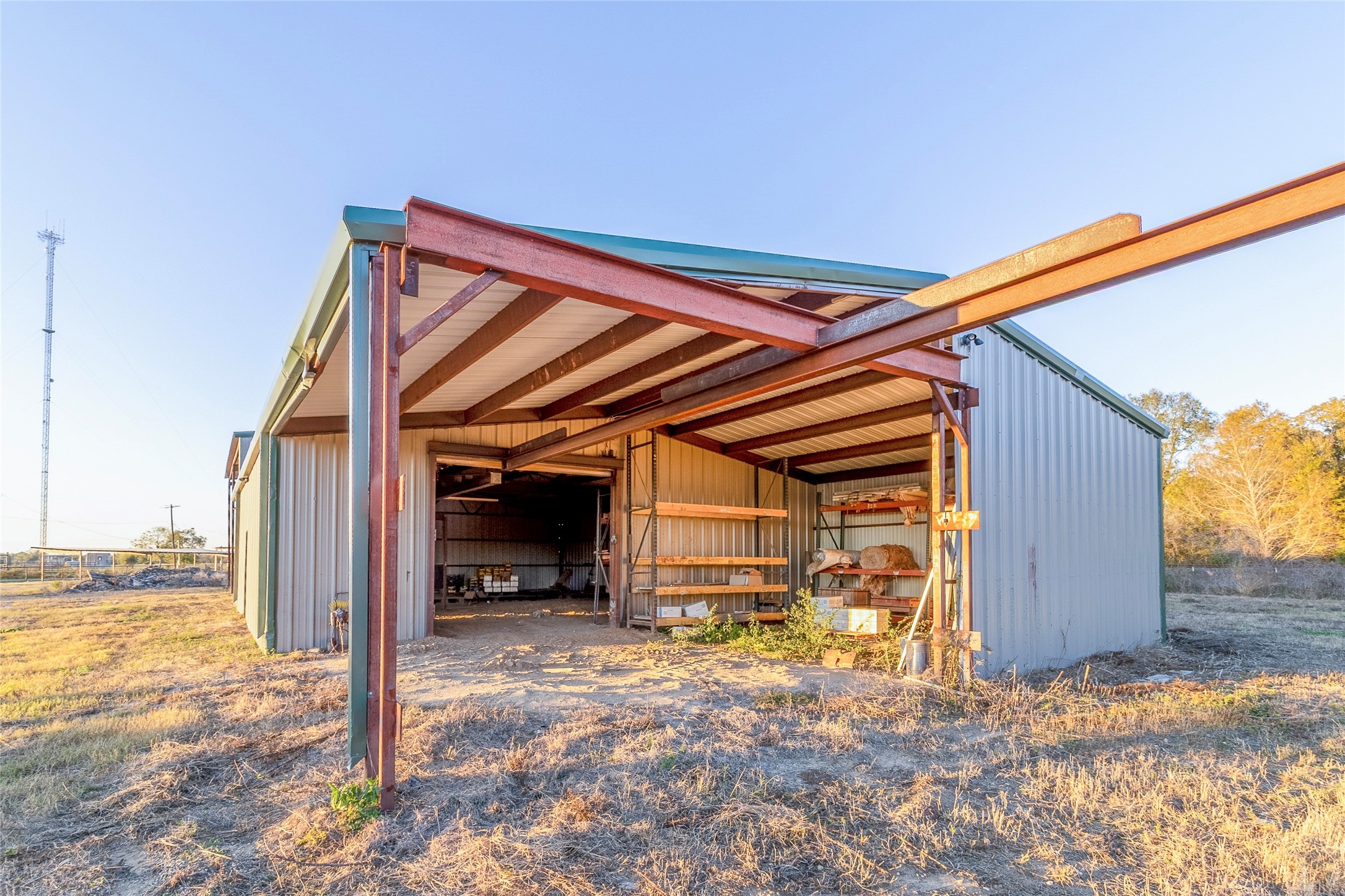 9477 County Road 420 Navasota, TX 77868 - Photo 7 of 25 a view of a car park in front of house