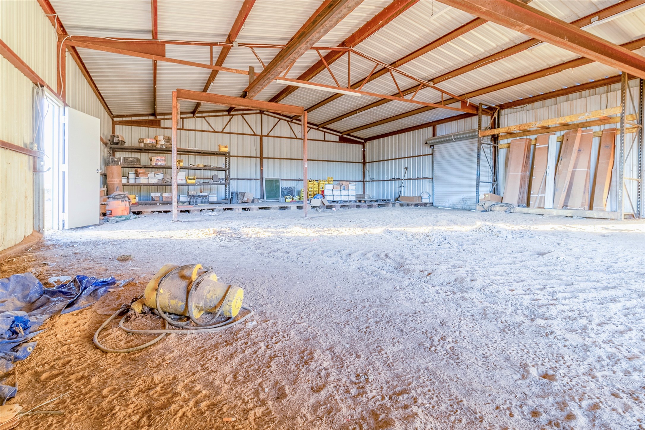 9477 County Road 420 Navasota, TX 77868 - Photo 8 of 25 a view of a livingroom with furniture and a window