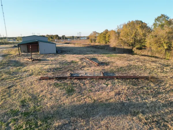a view of a yard with an outdoor space