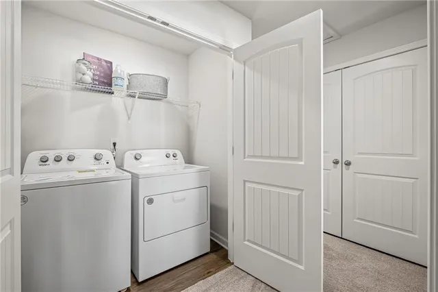 a utility room with dryer and washer