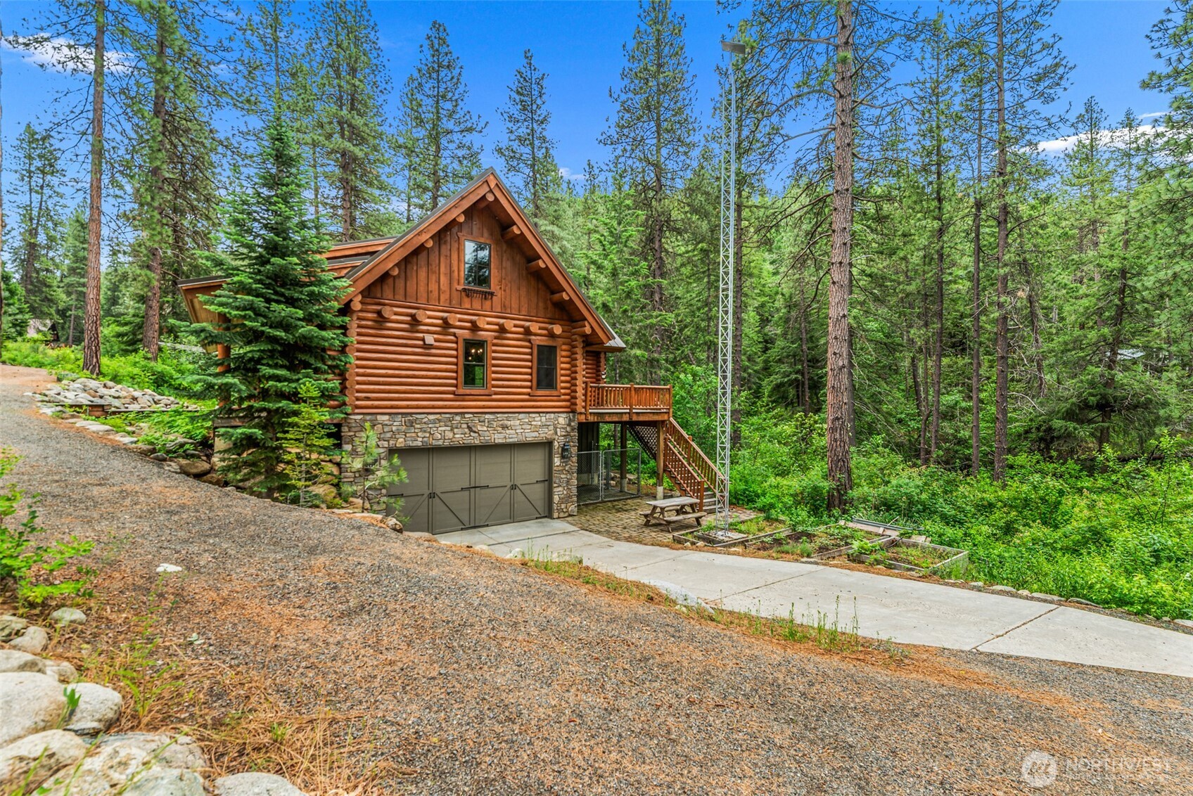 3888 Camas Creek Road Peshastin, WA 98847 - Photo 36 of 40 a view of a house with a yard and large trees