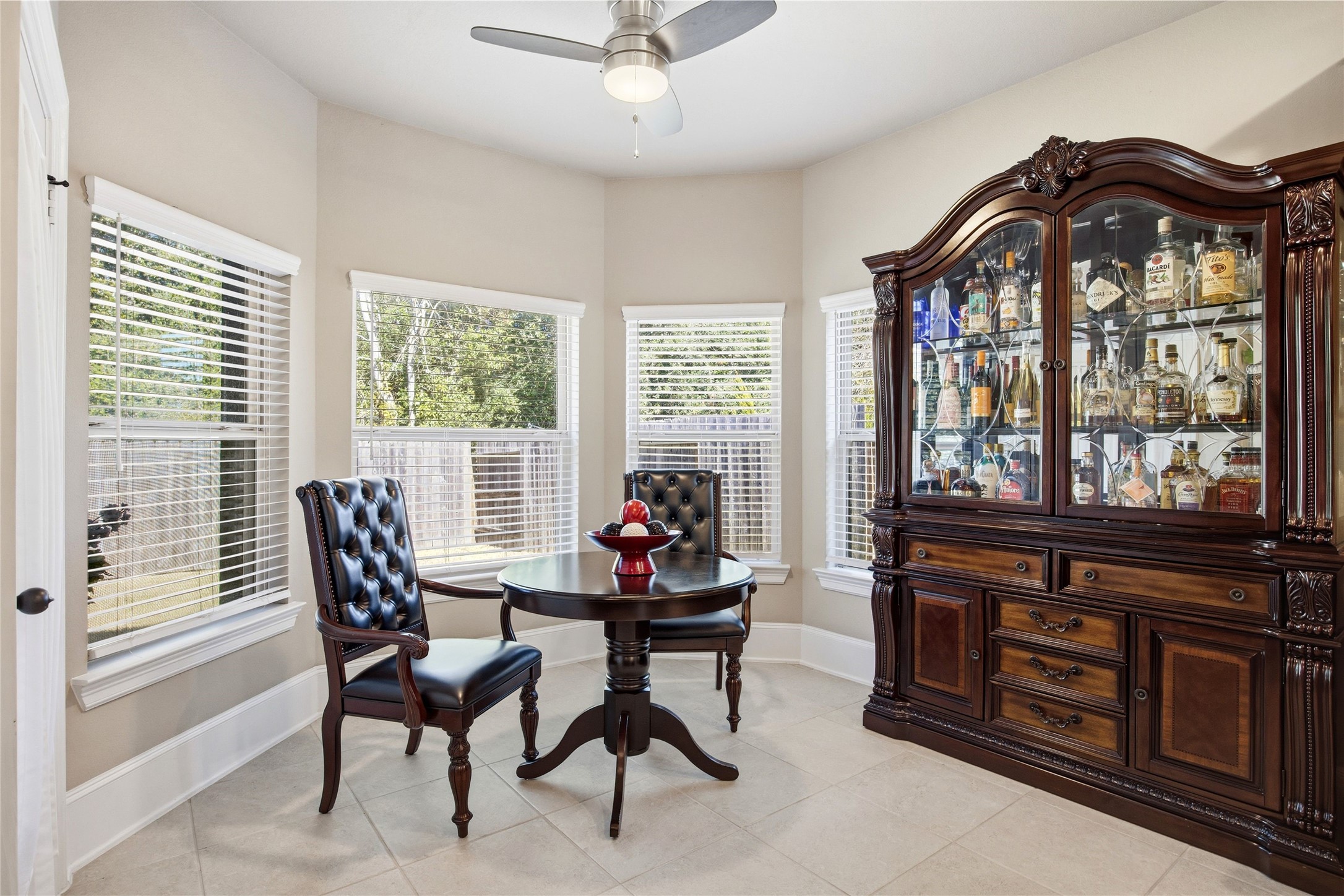 3313 Flagstone Drive Manvel, TX 77578 - Photo 17 of 39 a living room with furniture a large window and a chandelier