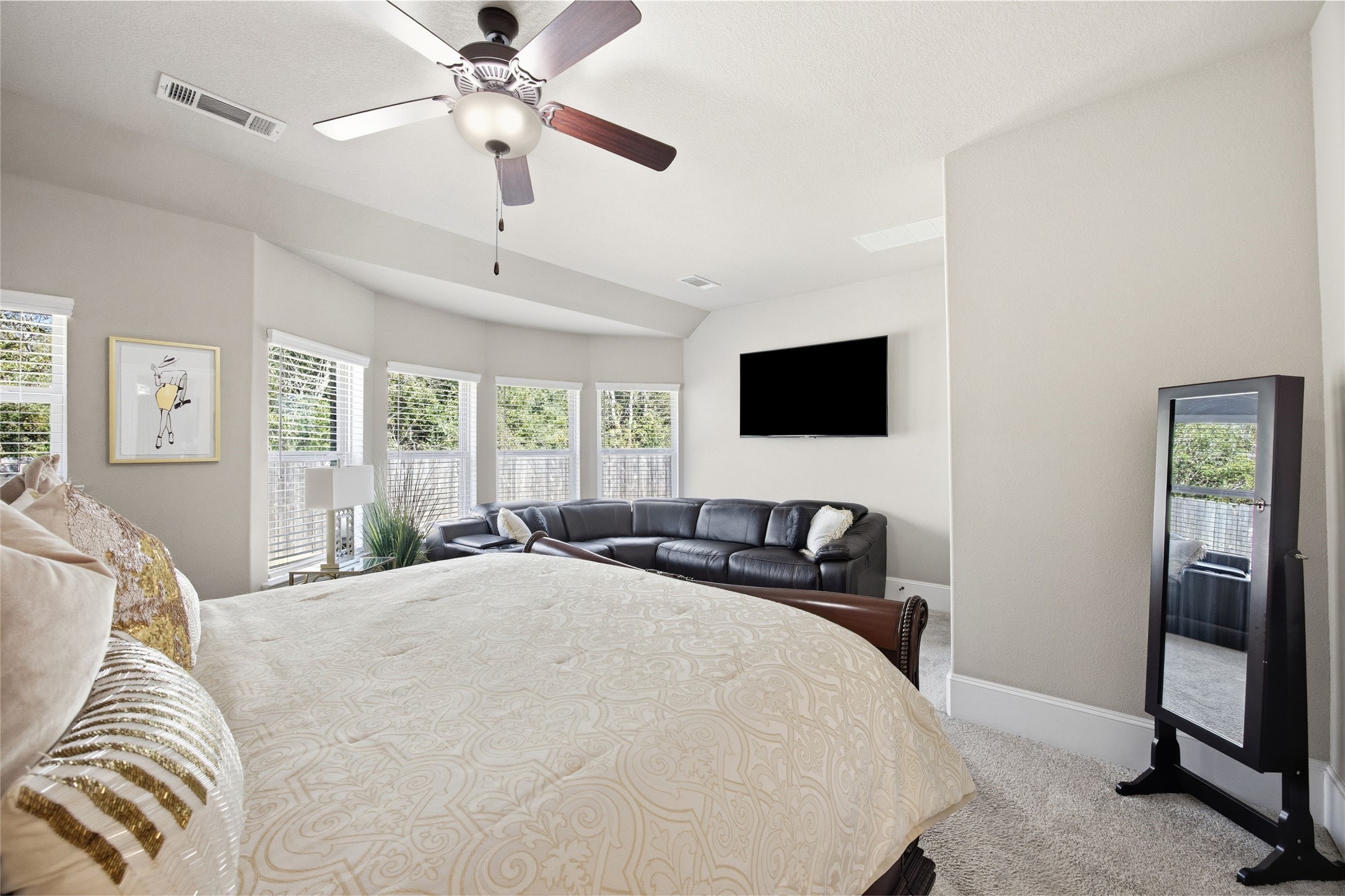 3313 Flagstone Drive Manvel, TX 77578 - Photo 19 of 39 a bedroom with a bed and a flat tv screen