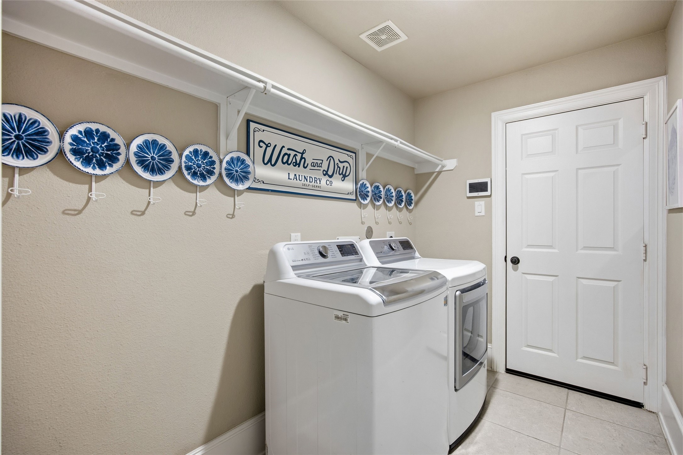 3313 Flagstone Drive Manvel, TX 77578 - Photo 23 of 39 a utility room with dryer and washer