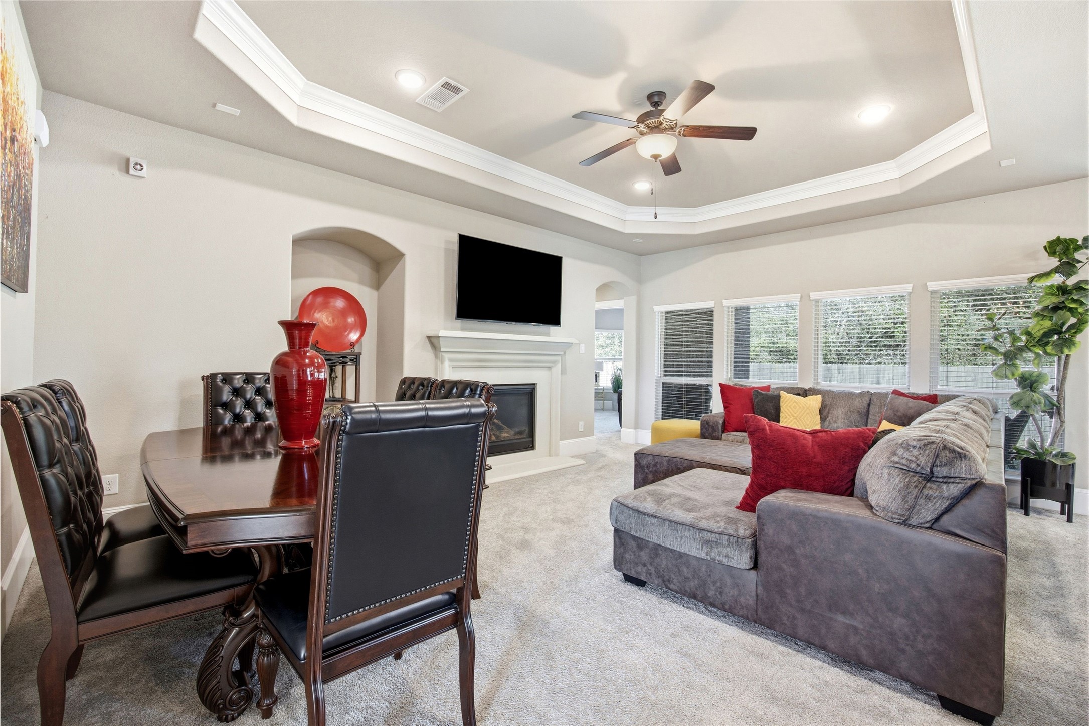 3313 Flagstone Drive Manvel, TX 77578 - Photo 7 of 39 a living room with furniture a fireplace and a flat screen tv