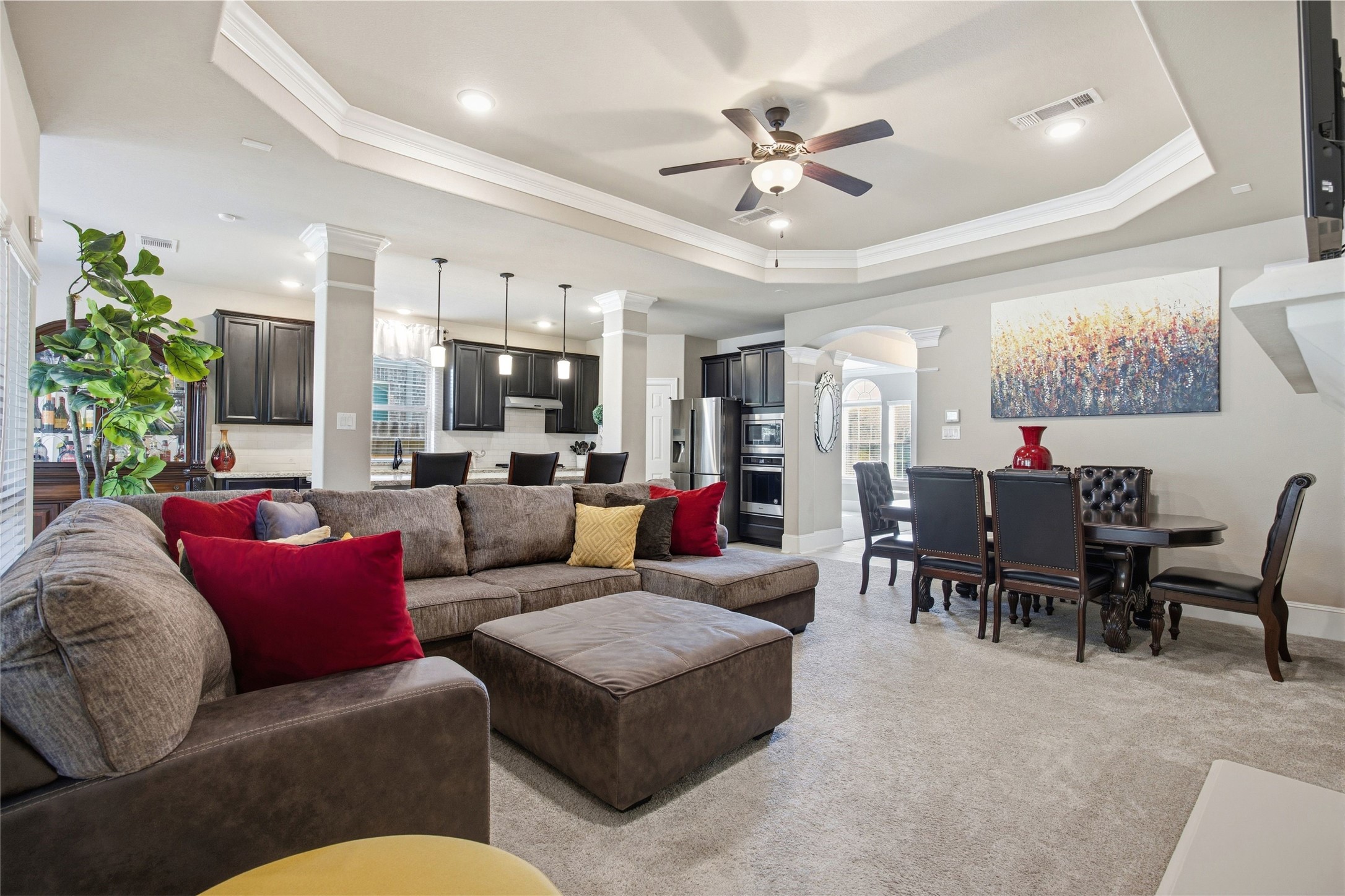 3313 Flagstone Drive Manvel, TX 77578 - Photo 8 of 39 a living room with furniture kitchen view and a chandelier