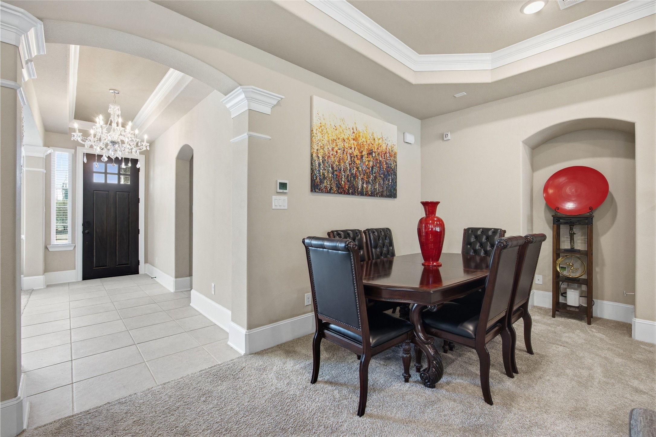 3313 Flagstone Drive Manvel, TX 77578 - Photo 10 of 39 a view of a dining room with furniture and chandelier