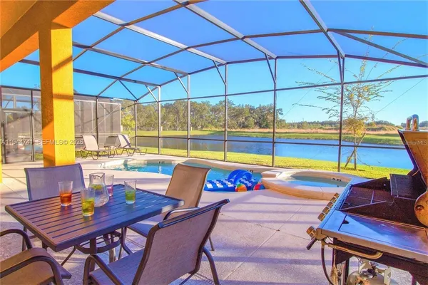 a view of an outdoor sitting area with furniture