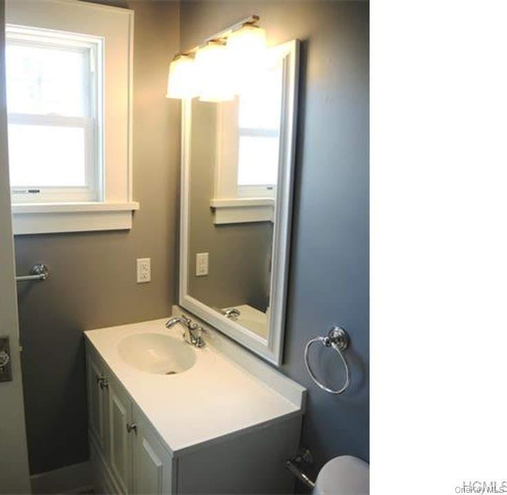 471 Webster Avenue New Rochelle, NY 10801 - Photo 14 of 22 Bathroom featuring vanity and toilet