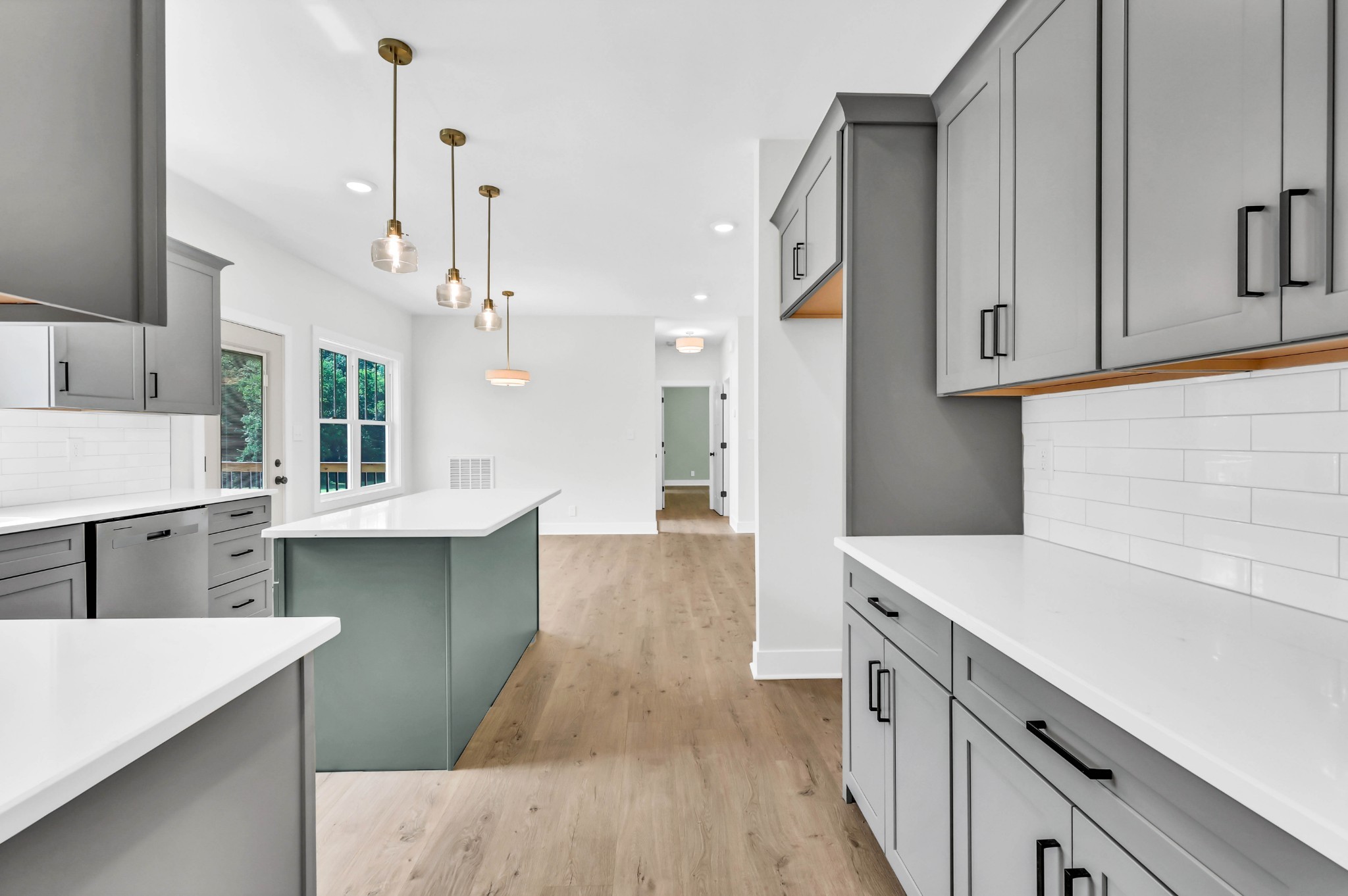 5590 Chambers Road Cumberland Furnace, TN 37051 - Photo 15 of 47 a kitchen with stainless steel appliances sink refrigerator and cabinets