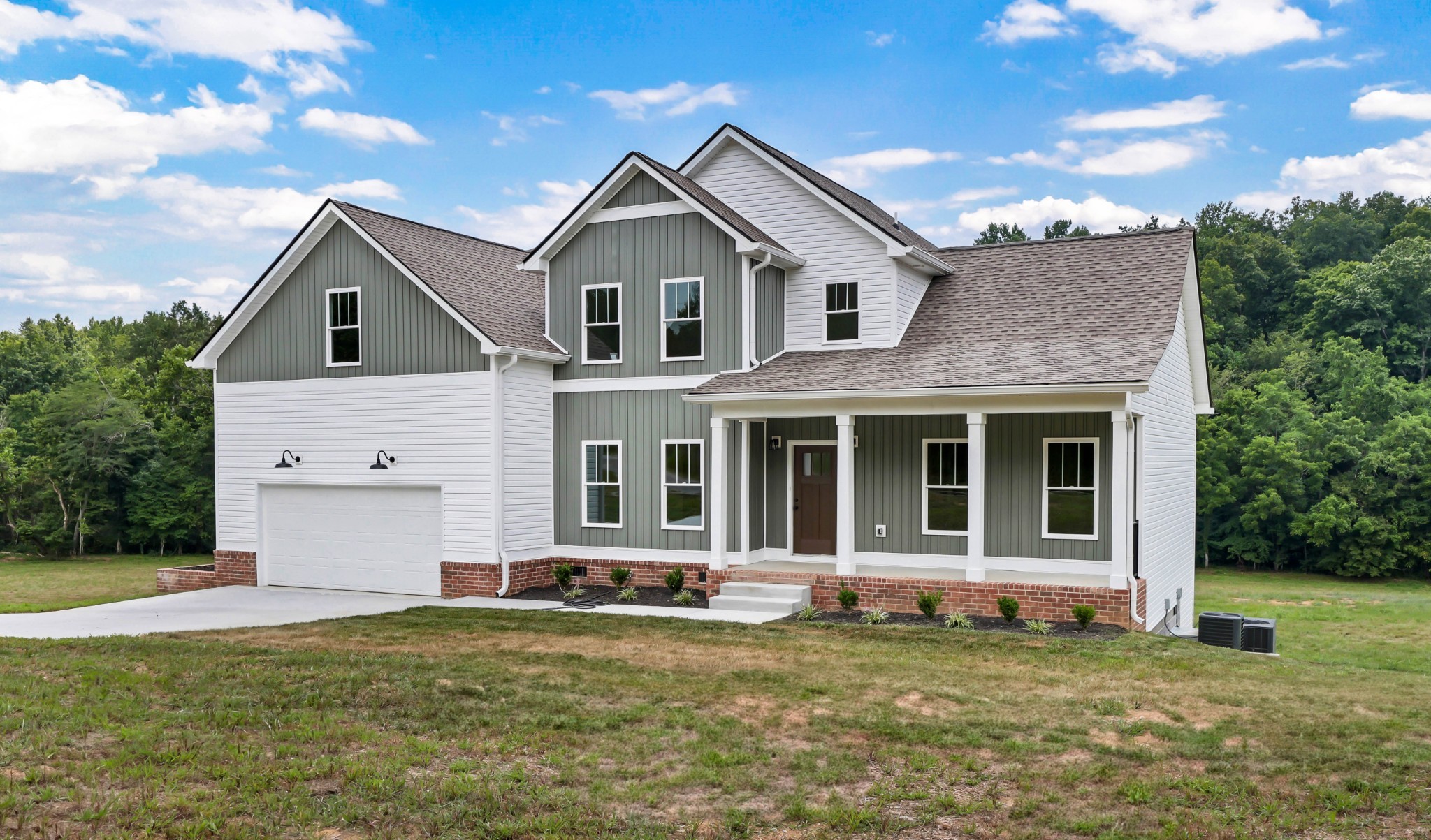 5590 Chambers Road Cumberland Furnace, TN 37051 - Photo 2 of 47 a front view of a house with a yard