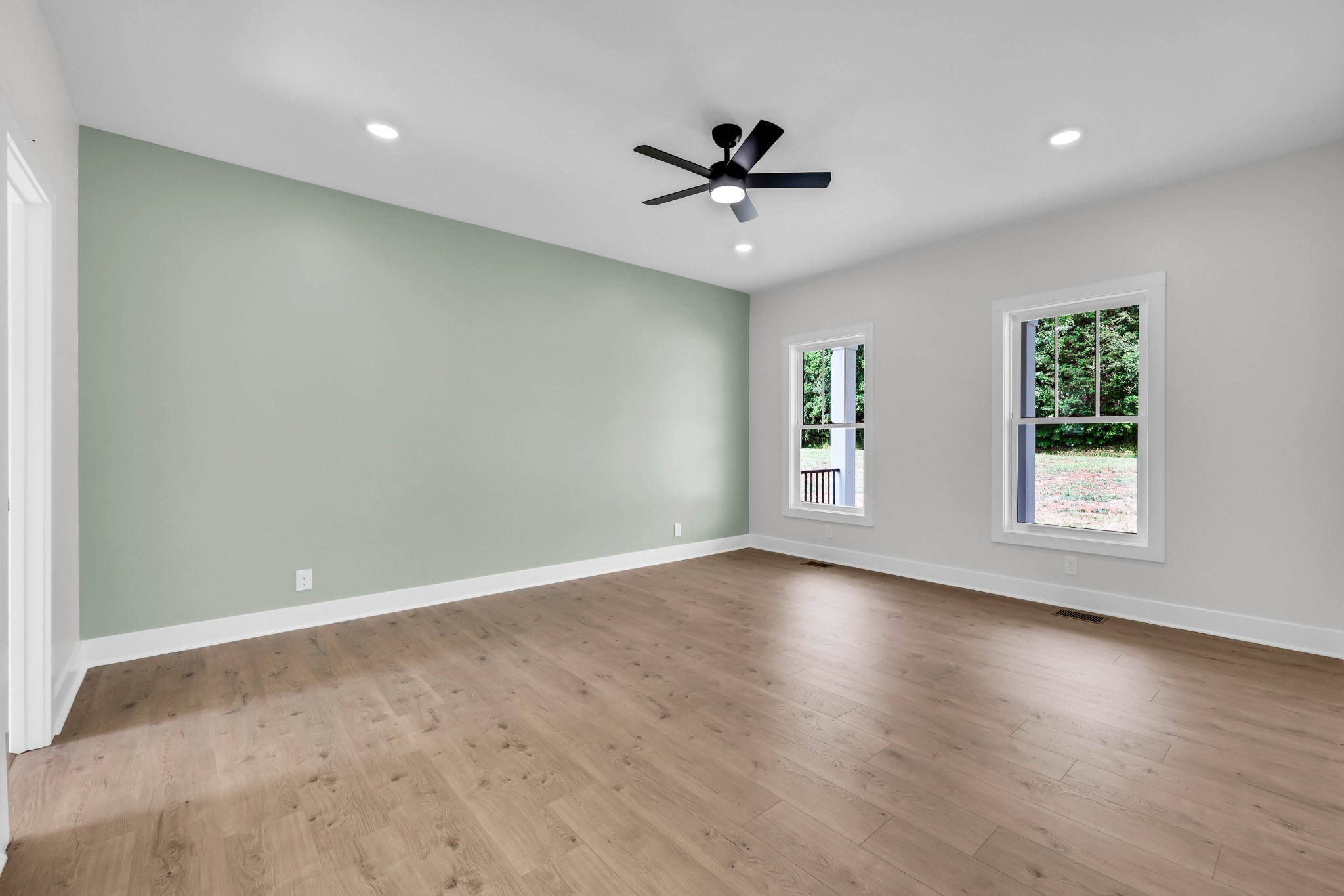 5590 Chambers Road Cumberland Furnace, TN 37051 - Photo 23 of 47 a view of an empty room with a window and wooden floor