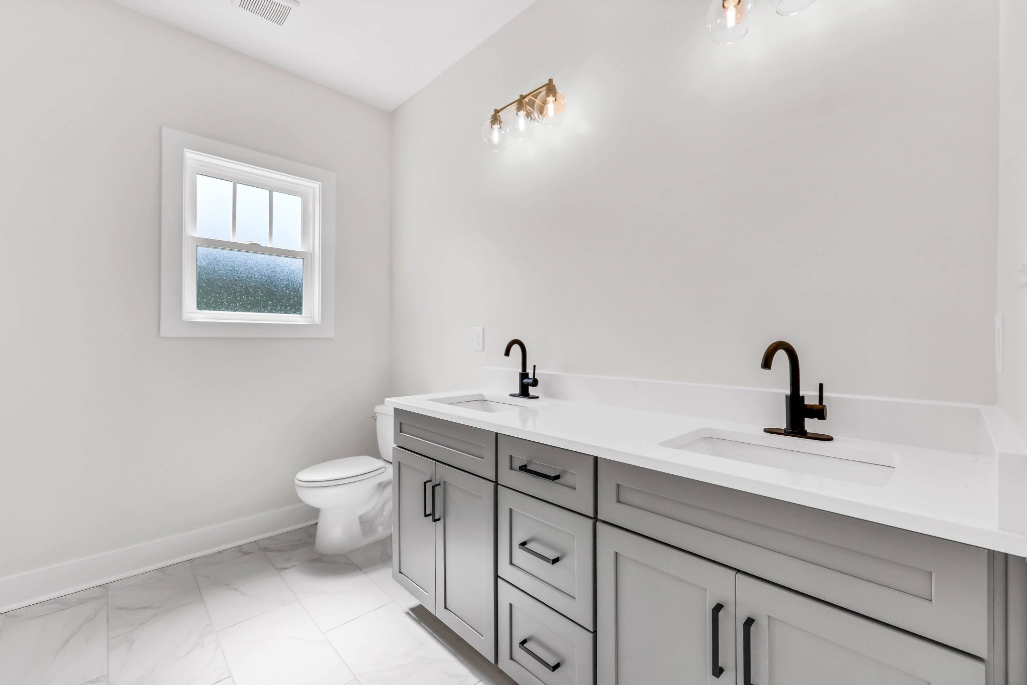 5590 Chambers Road Cumberland Furnace, TN 37051 - Photo 26 of 47 a bathroom with a toilet sink and mirror