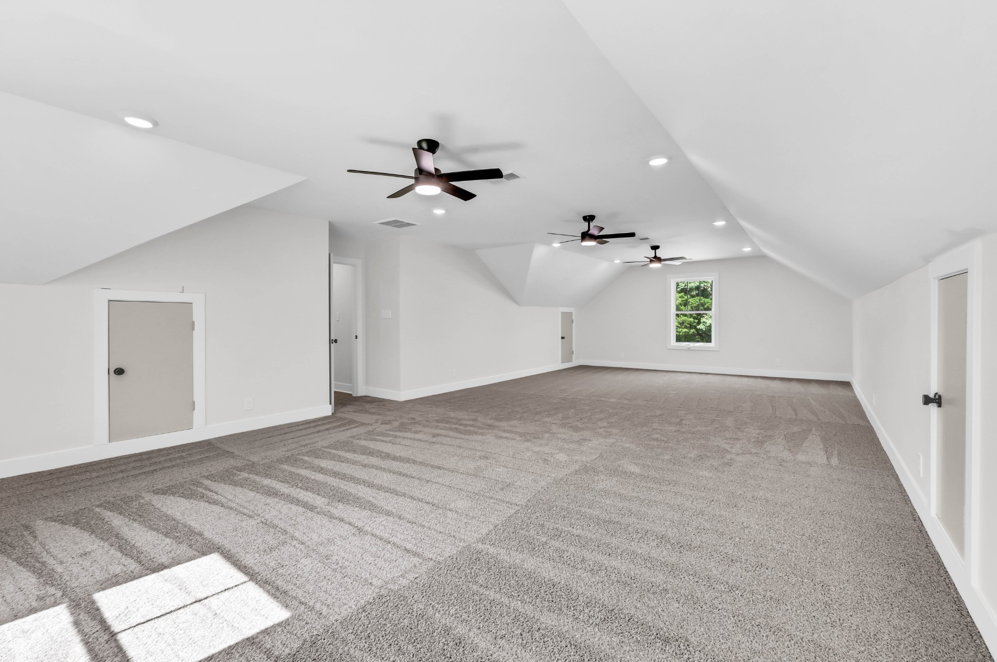 5590 Chambers Road Cumberland Furnace, TN 37051 - Photo 35 of 47 a view of a kitchen with a sink and a chandelier fan