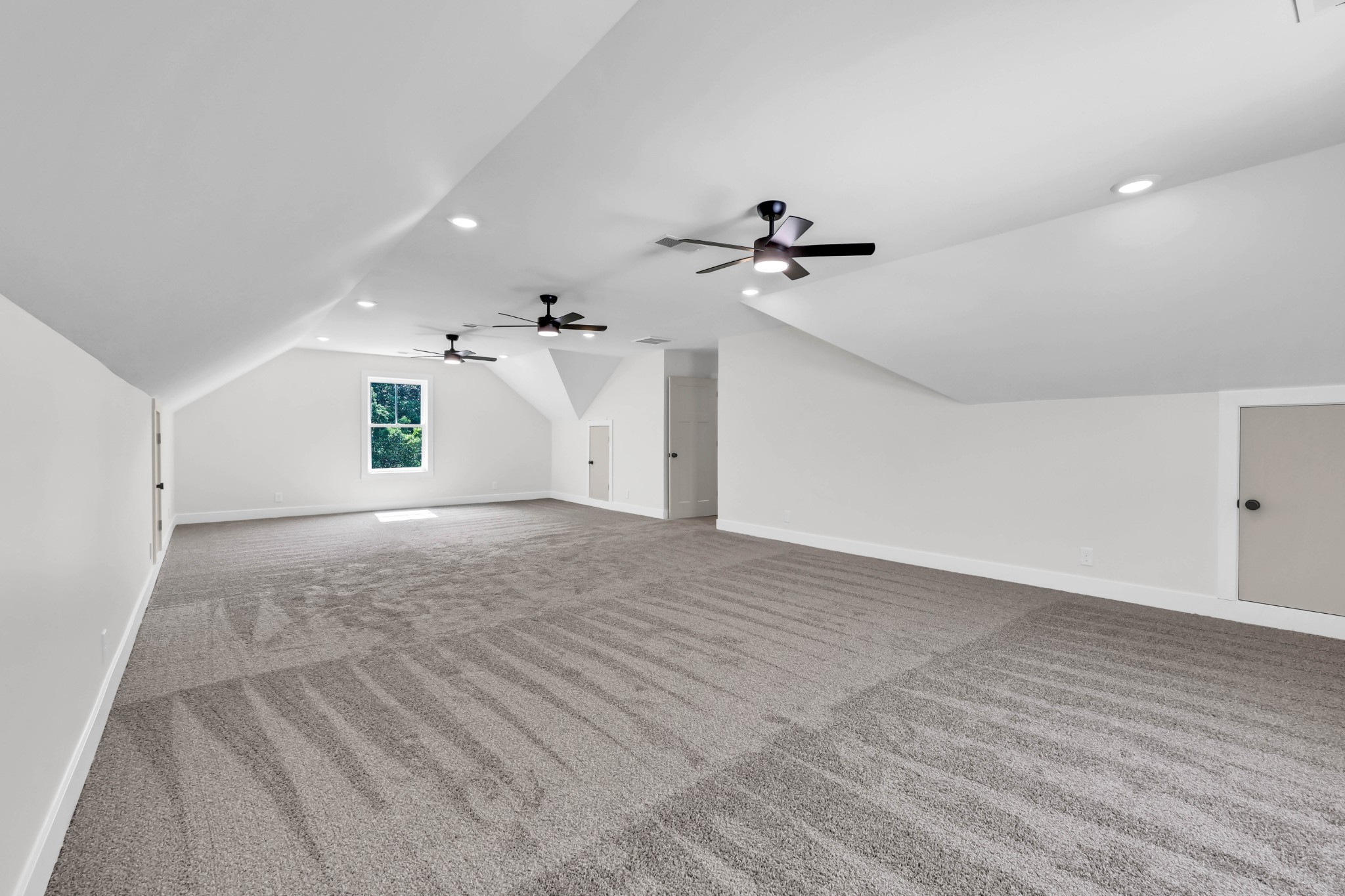 5590 Chambers Road Cumberland Furnace, TN 37051 - Photo 36 of 47 a view of a livingroom with a ceiling fan window and wooden floor