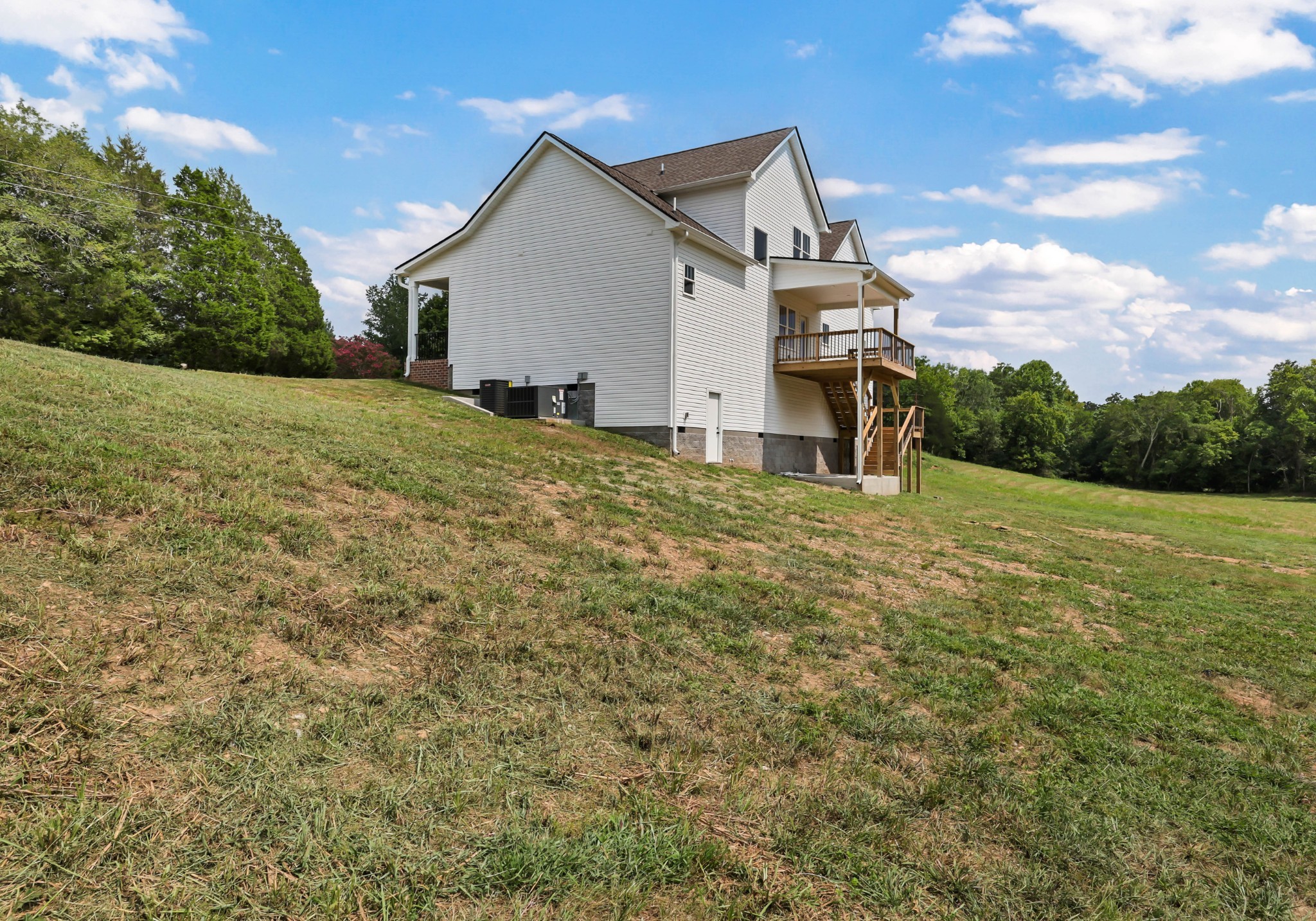 5590 Chambers Road Cumberland Furnace, TN 37051 - Photo 41 of 47 a view of a house with a yard