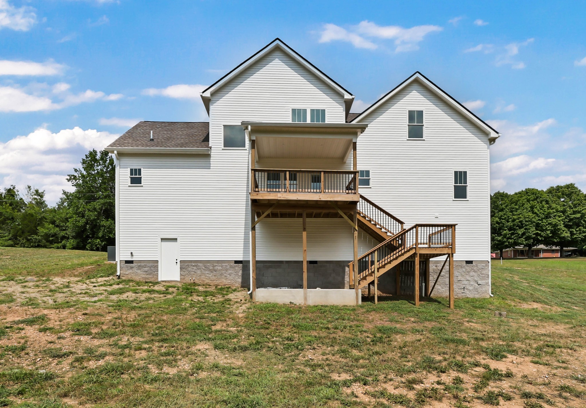 5590 Chambers Road Cumberland Furnace, TN 37051 - Photo 42 of 47 a view of a house with backyard and garden