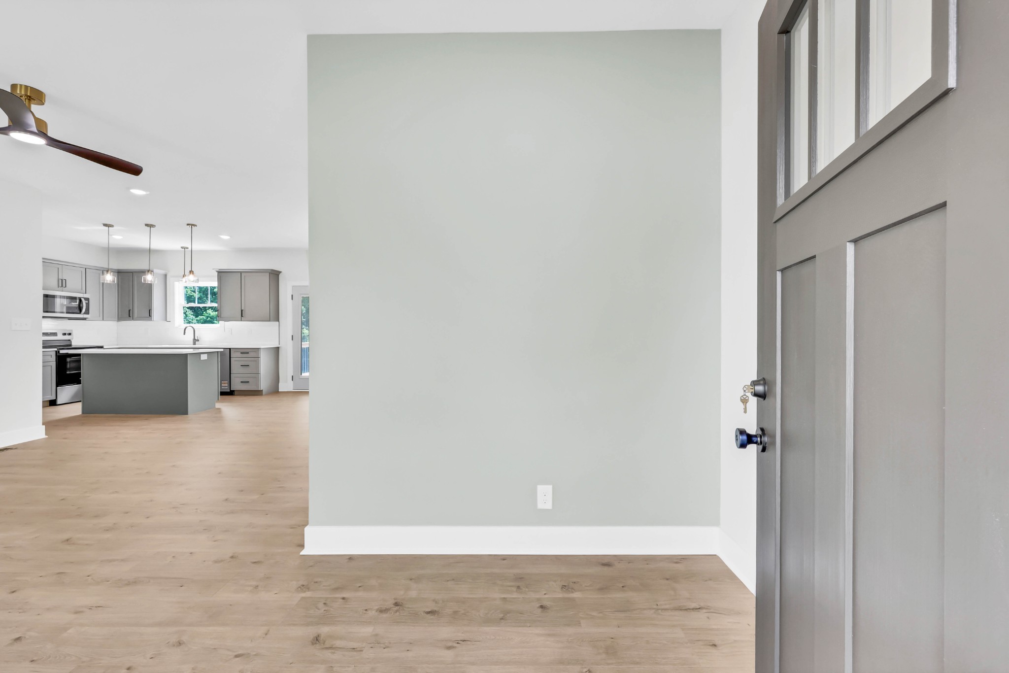 5590 Chambers Road Cumberland Furnace, TN 37051 - Photo 6 of 47 a view of a kitchen with wooden floor and a kitchen