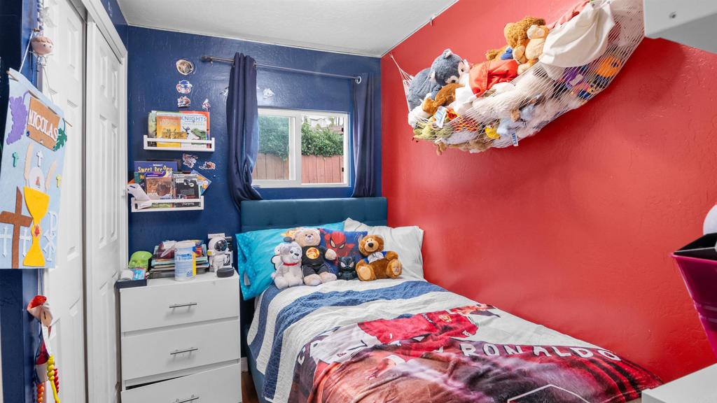 1455 Alturas Street, Unit 46 Fallbrook, CA 92028 - Photo 16 of 34 a bedroom with a bed and a window