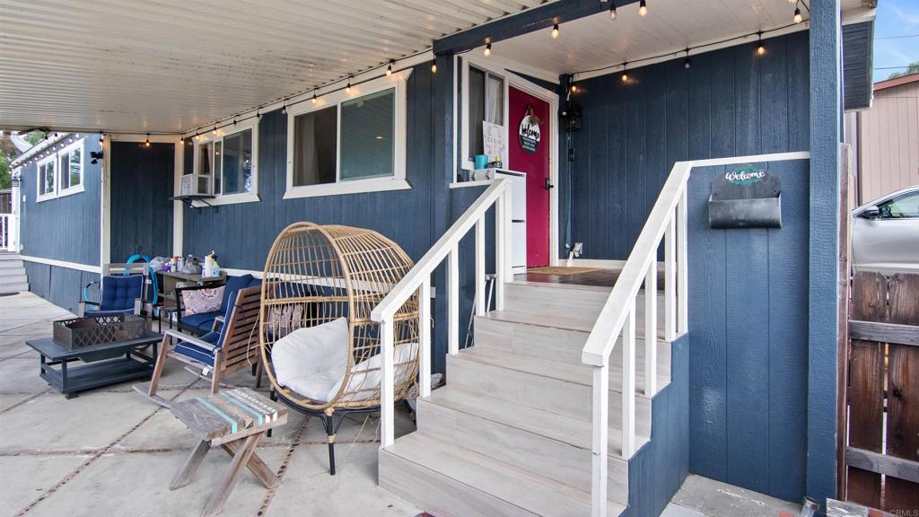 1455 Alturas Street, Unit 46 Fallbrook, CA 92028 - Photo 23 of 34 a dinning room with furniture and wooden floor