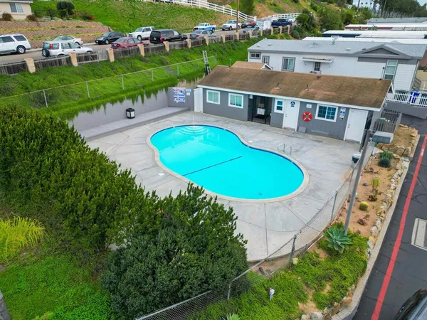 a view of a backyard with a patio