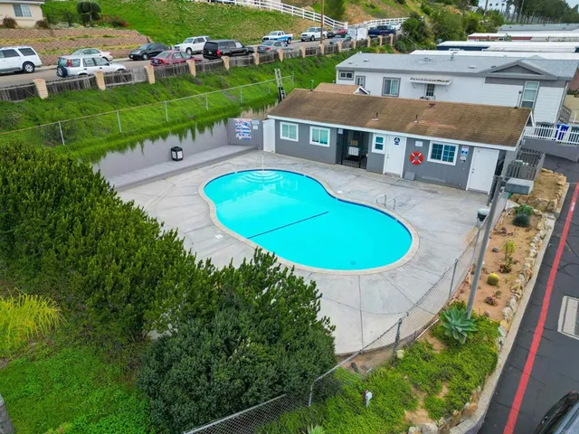 a view of a backyard with a patio