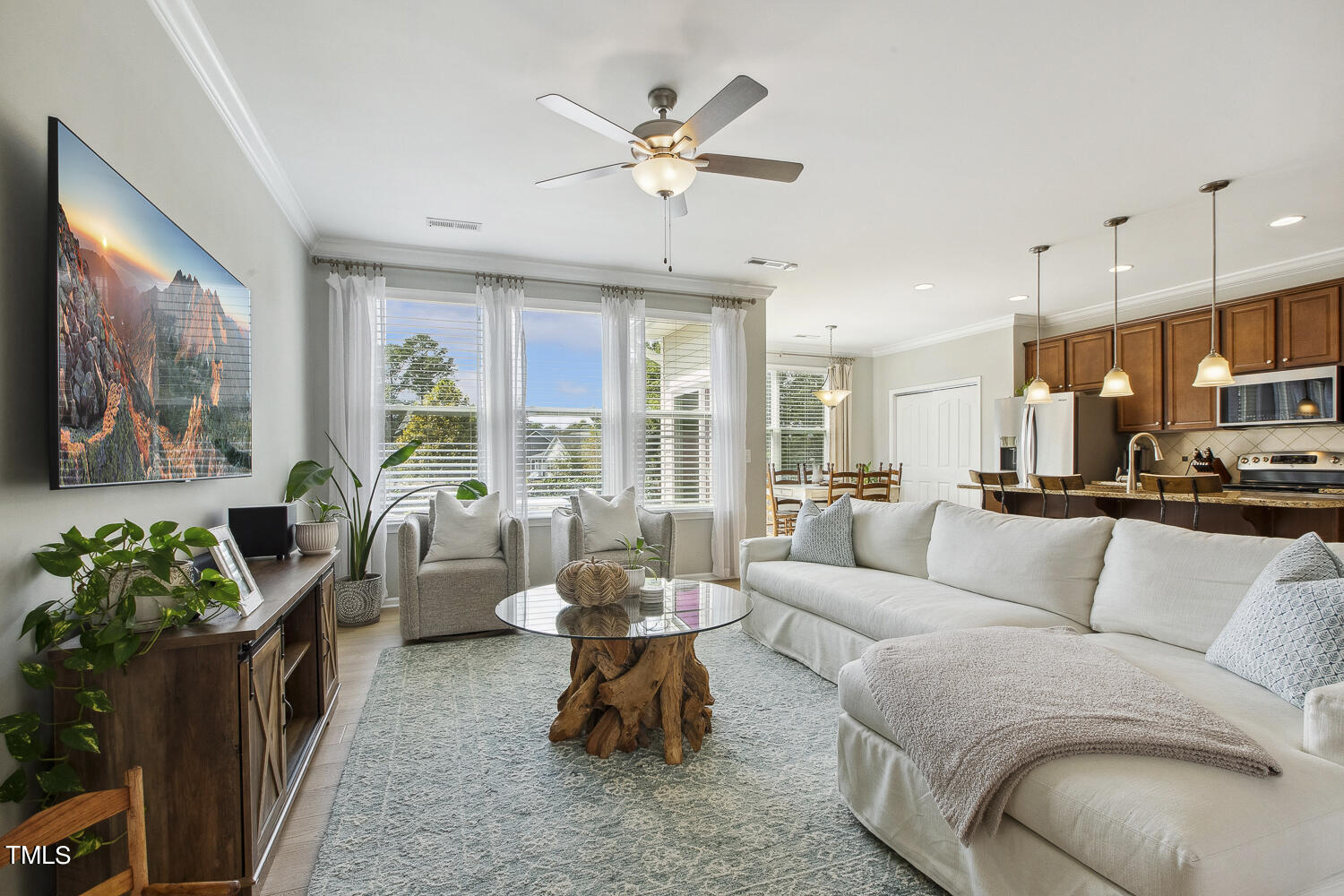 3604 Norman Blalock Road Willow Spring, NC 27592 - Photo 13 of 51 a living room with furniture and a large window