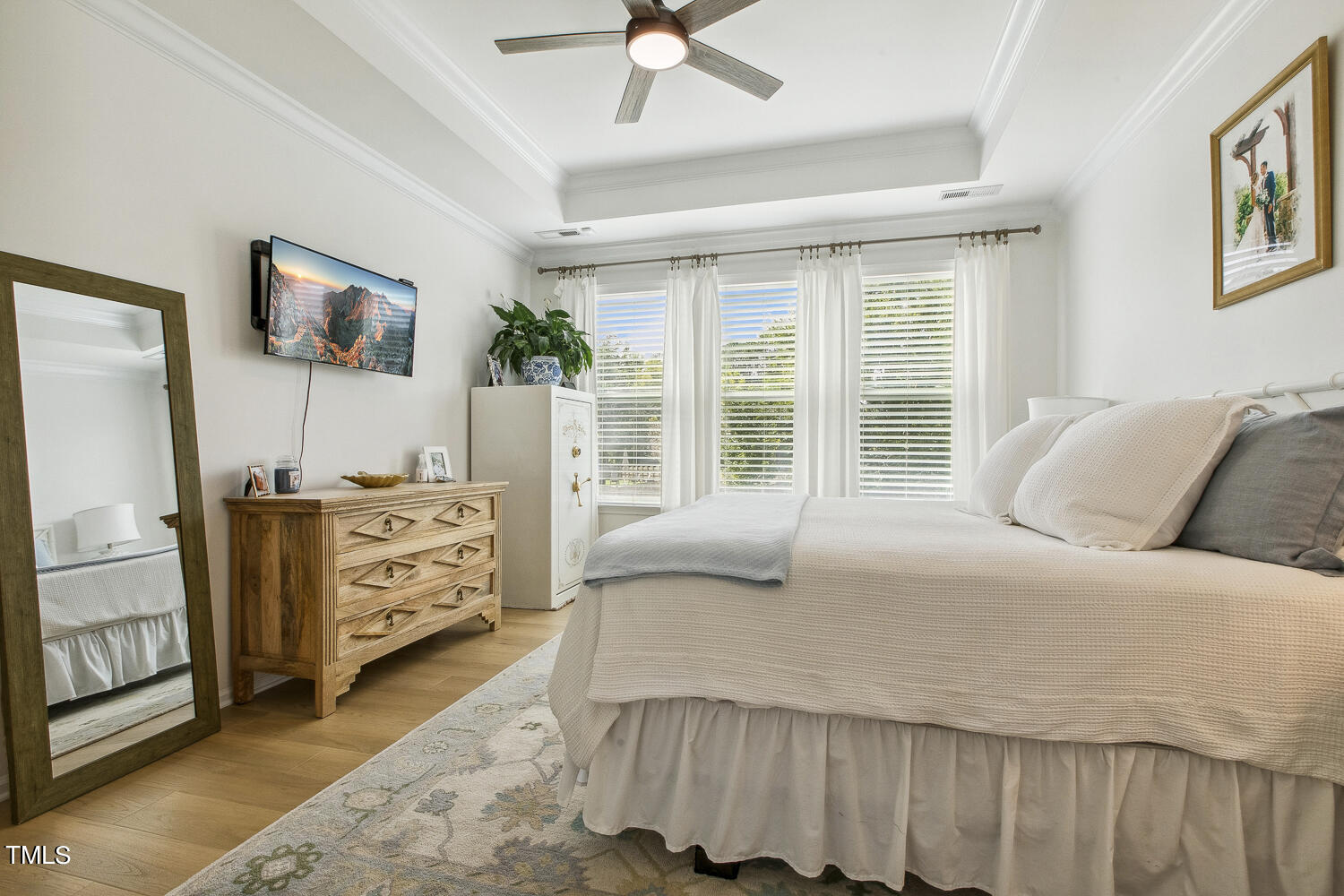 3604 Norman Blalock Road Willow Spring, NC 27592 - Photo 32 of 51 a bedroom with a bed and a window