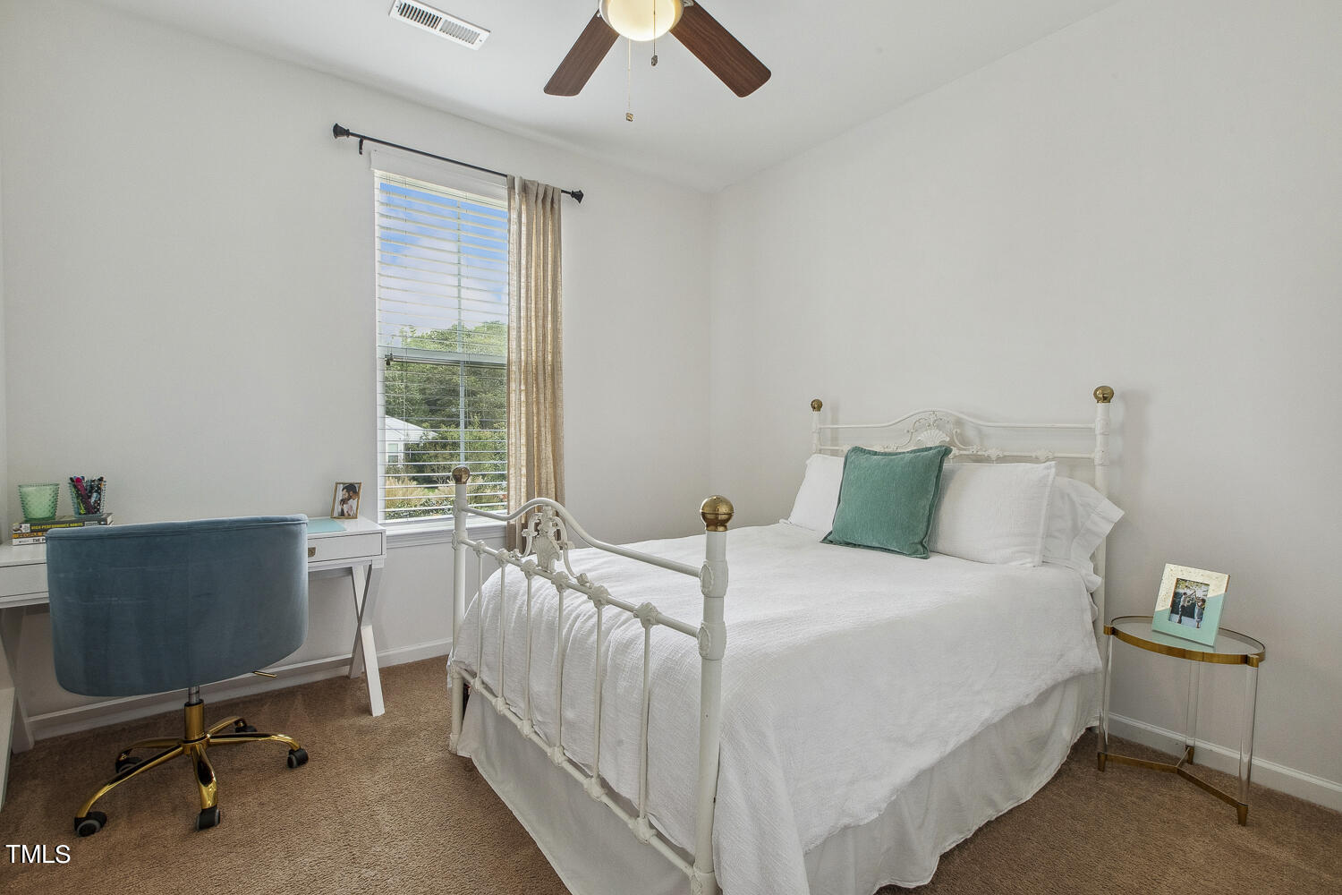 3604 Norman Blalock Road Willow Spring, NC 27592 - Photo 37 of 51 a bedroom with a bed and a desk