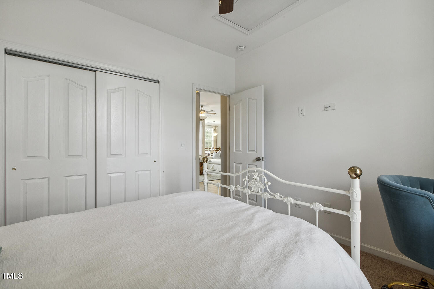 3604 Norman Blalock Road Willow Spring, NC 27592 - Photo 38 of 51 a bedroom with a bed and a chair