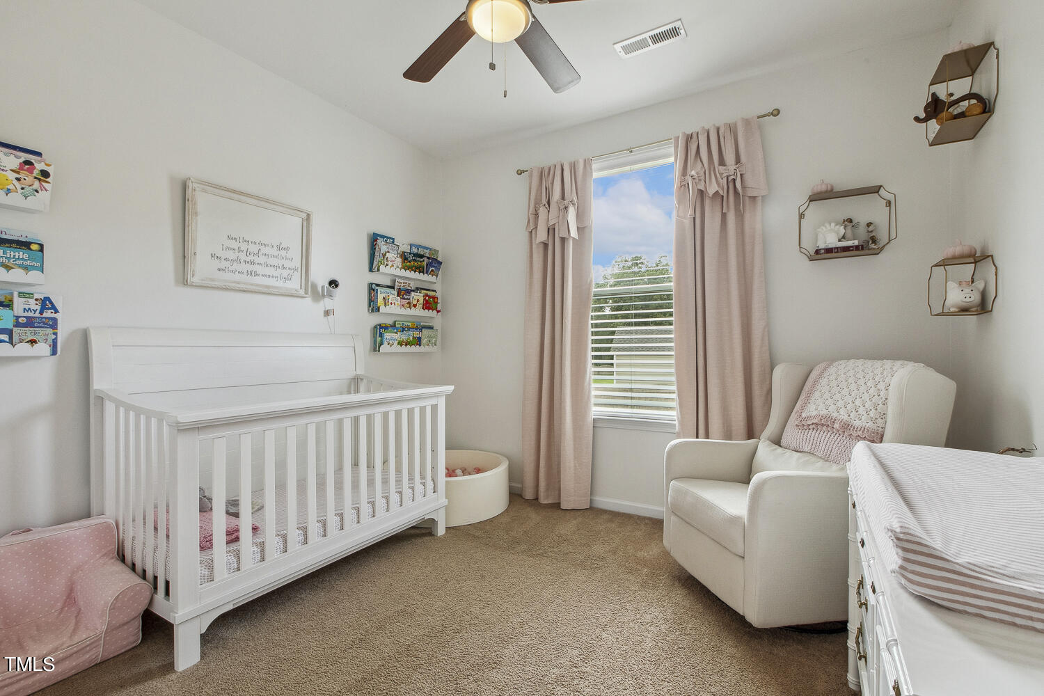 3604 Norman Blalock Road Willow Spring, NC 27592 - Photo 40 of 51 a bedroom with furniture and a window