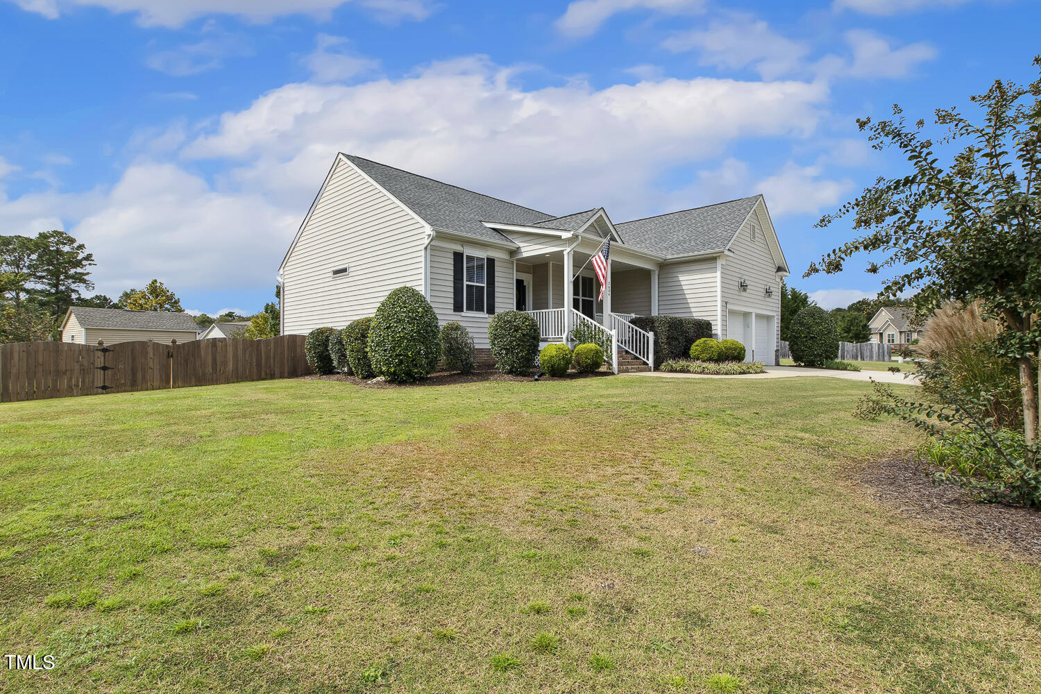 3604 Norman Blalock Road Willow Spring, NC 27592 - Photo 4 of 51 a front view of a house with a yard
