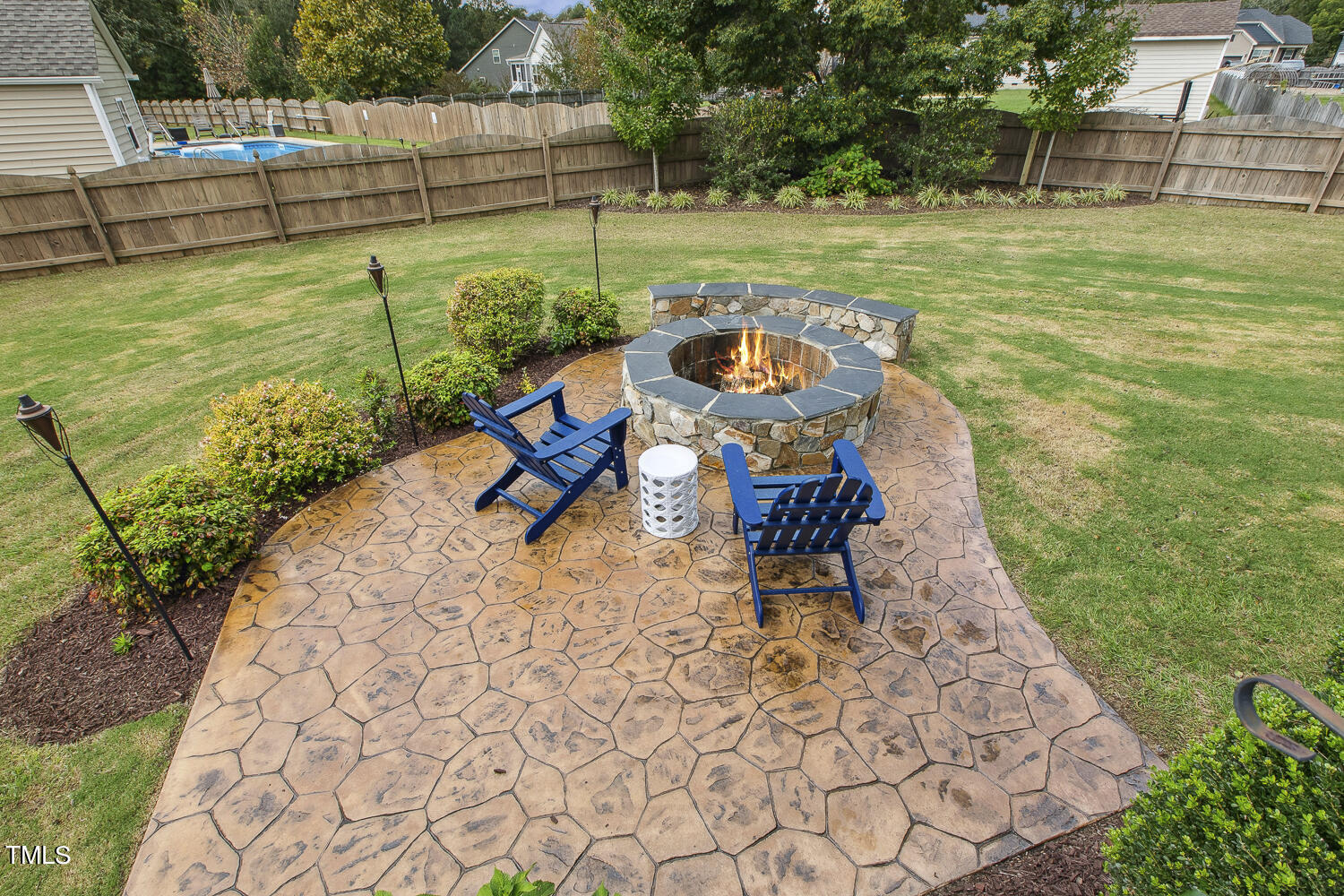 3604 Norman Blalock Road Willow Spring, NC 27592 - Photo 49 of 51 a view of a swimming pool with a patio