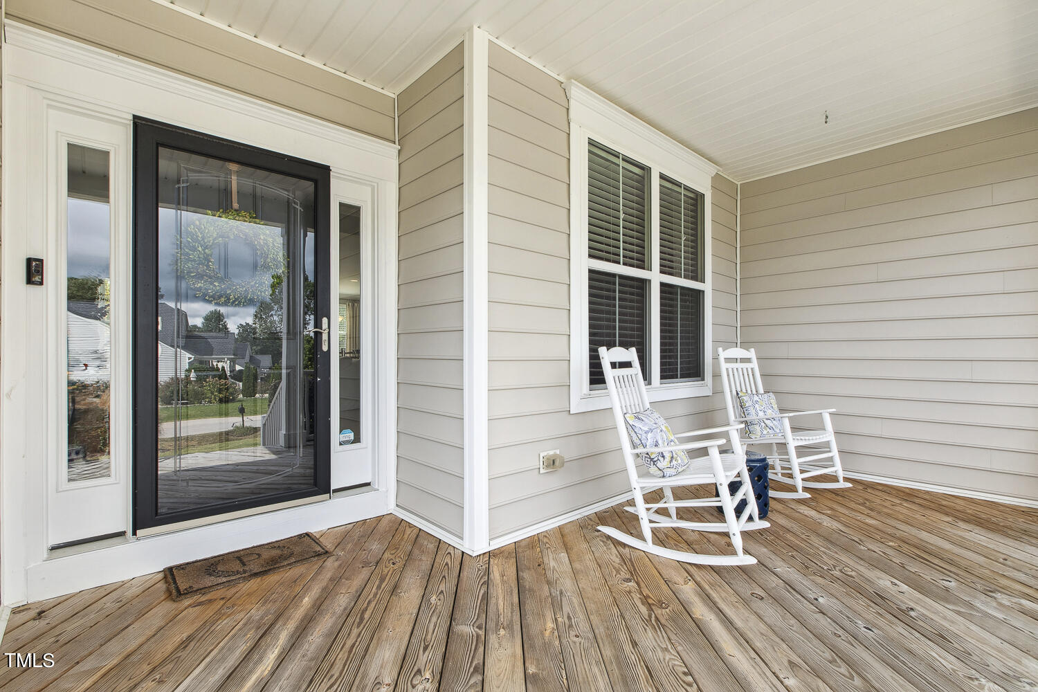 3604 Norman Blalock Road Willow Spring, NC 27592 - Photo 6 of 51 a view of a house with a patio and wooden floor