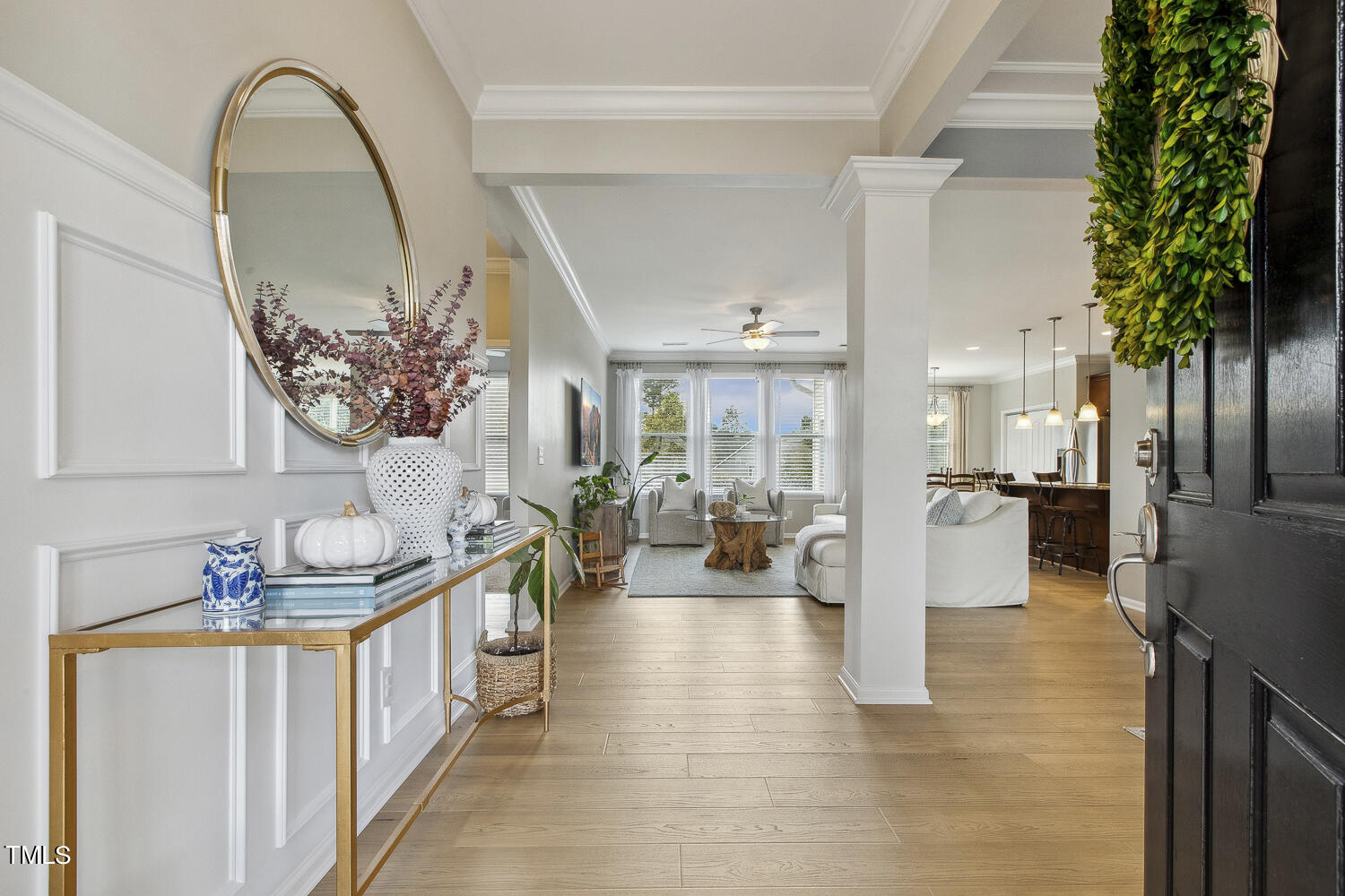 3604 Norman Blalock Road Willow Spring, NC 27592 - Photo 7 of 51 a living room with furniture and a potted plant